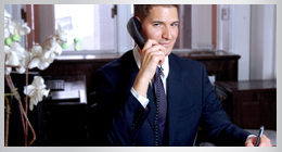 Male Receptionist in a Suit working as an agency staff member